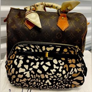 Salvatore Ferragamo Animal print pouch with dustbag